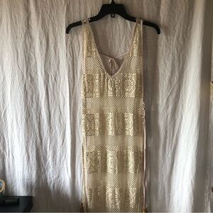 PILYQ mesh cream crochet cover up. Adjustable sides and tassels size S/M